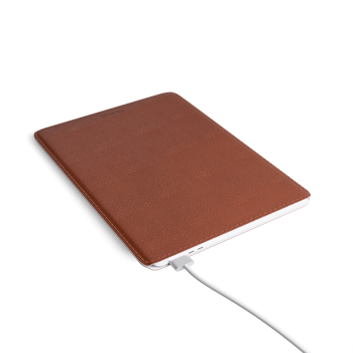 brown leather MacBook sleeve angled