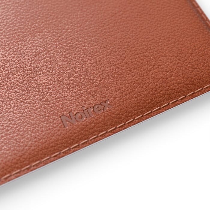 brown leather MacBook sleeve logo detail
