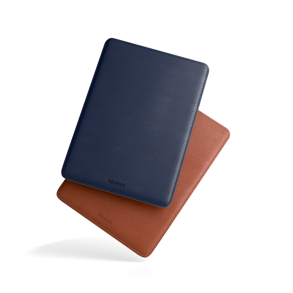 navy blue and brown leather MacBook sleeves